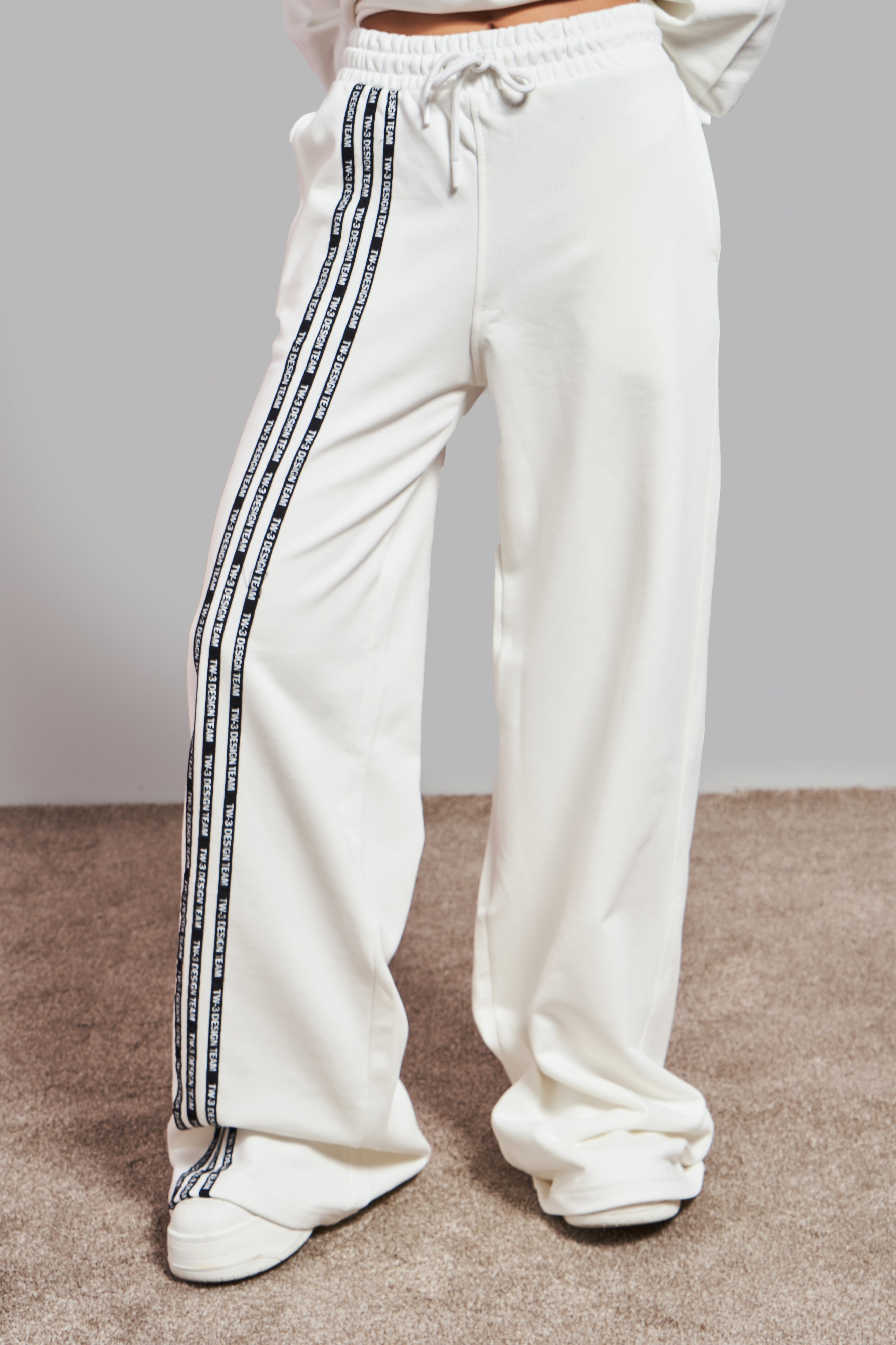 Women's Ecru Color Stripe Detailed Palazzo Fit Design Knitted Trousers