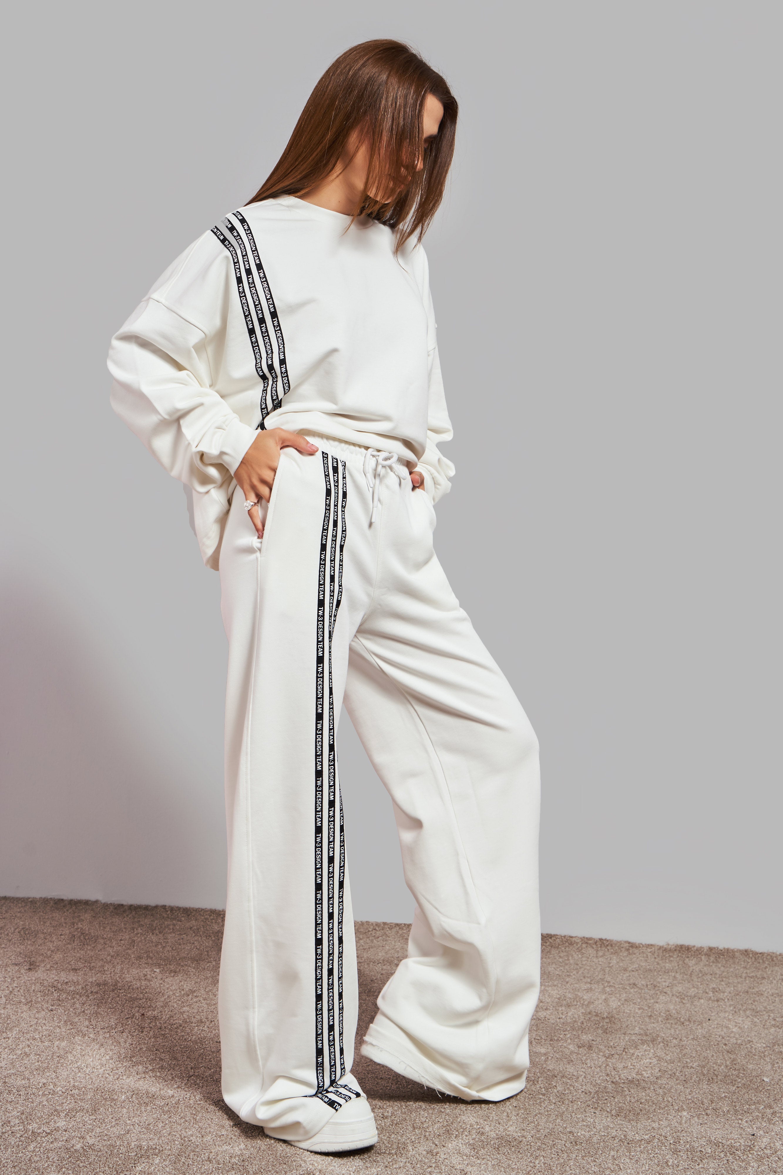 Women's Ecru Color Stripe Detailed Palazzo Fit Design Knitted Trousers