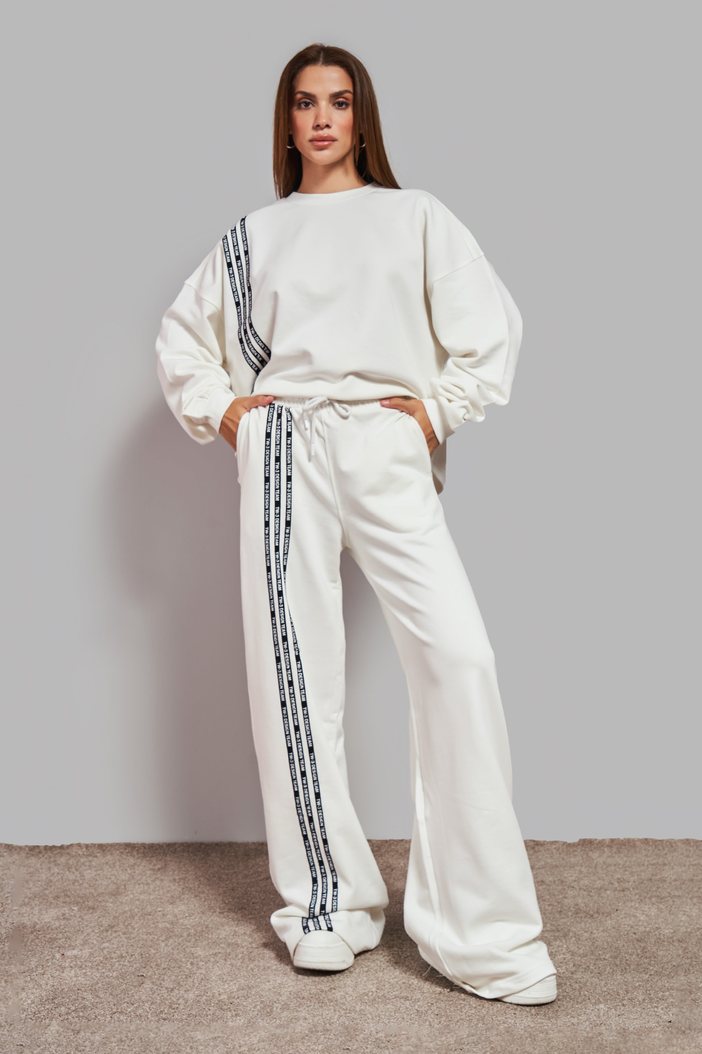 Women's Ecru Color Stripe Detailed Palazzo Fit Design Knitted Trousers