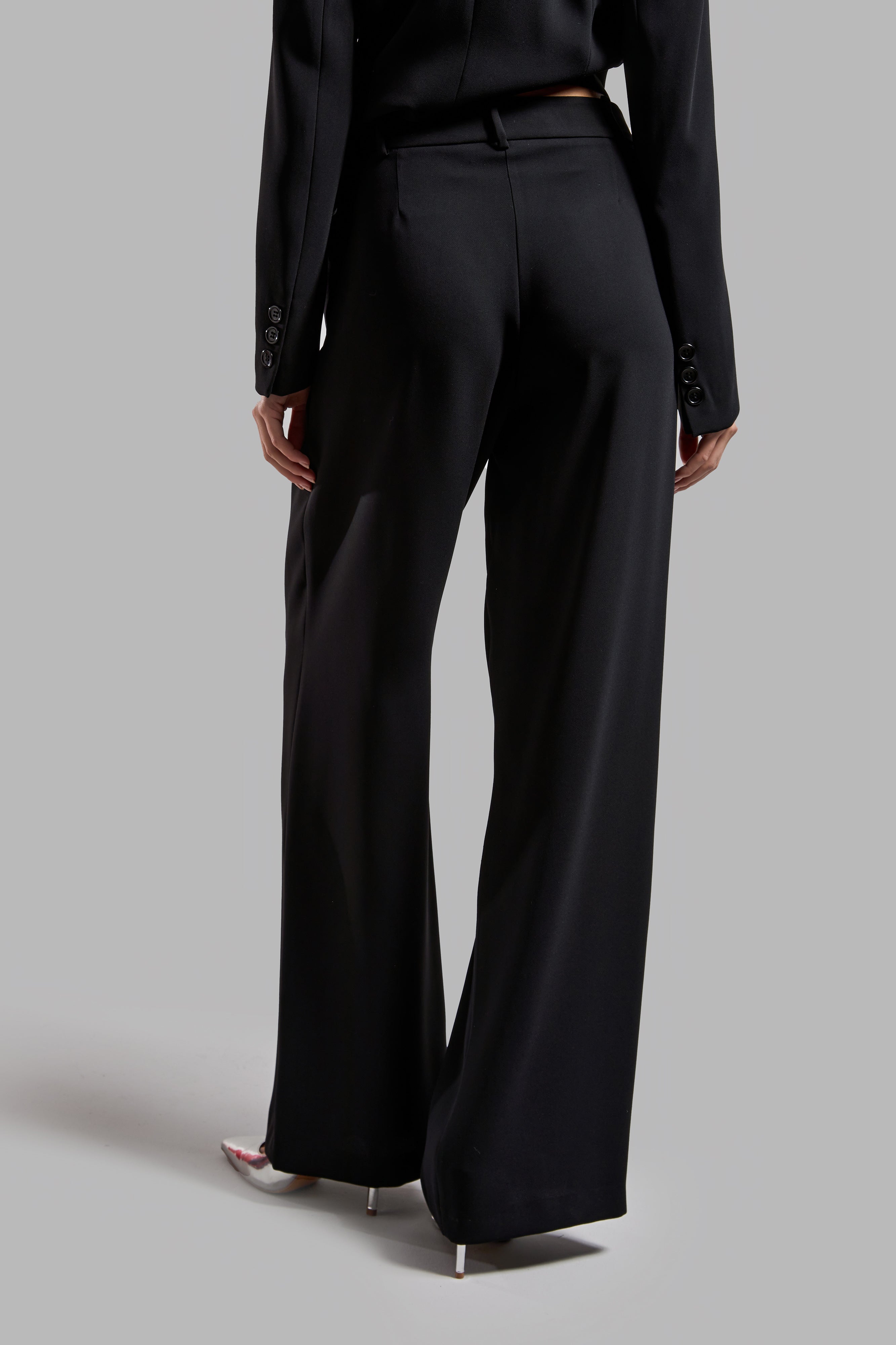 Women's Black Color Loose Cut Pleated Flowy Fabric Trousers