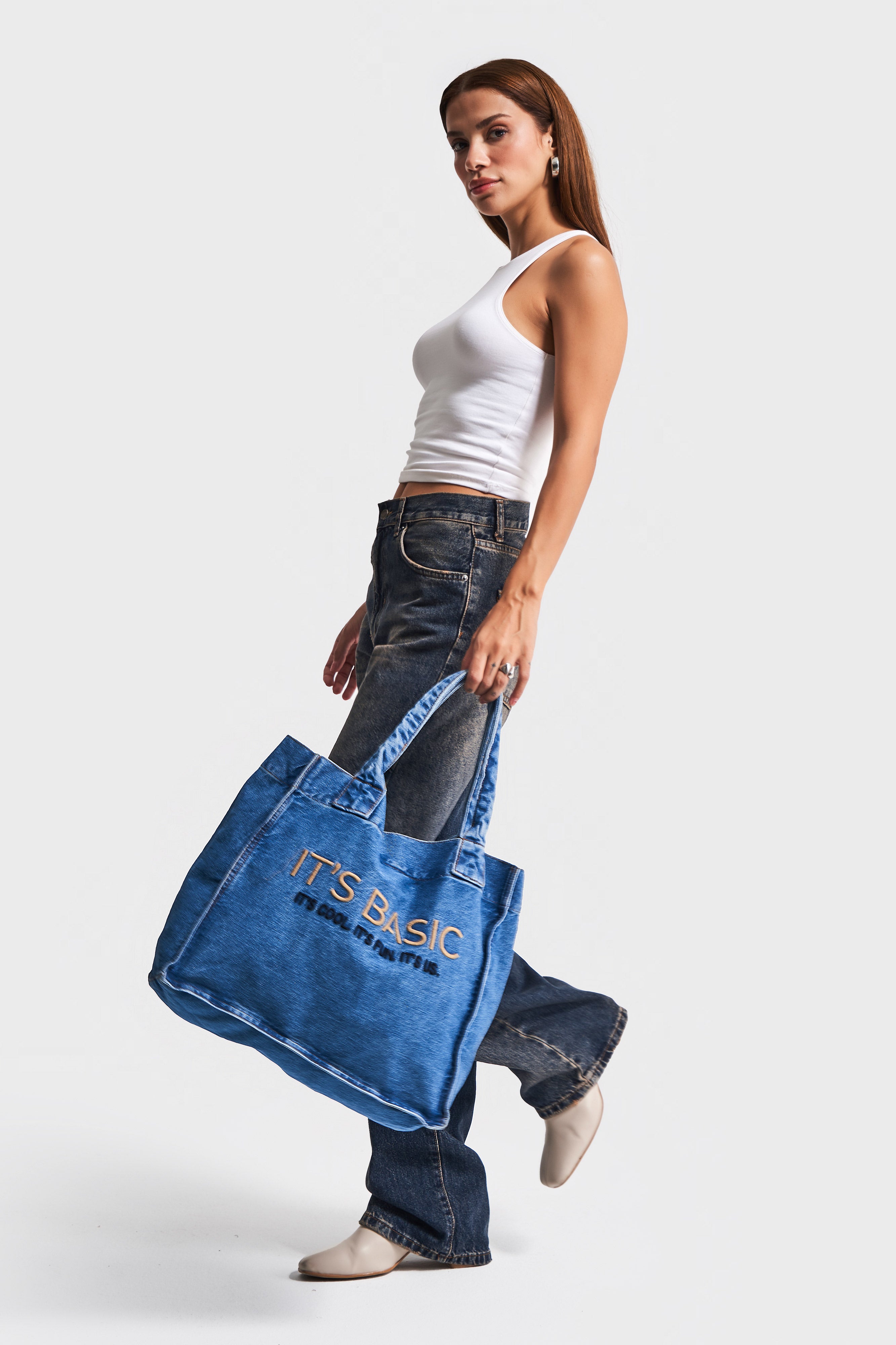 Its basic Embroidered Gusseted Shoulder Denim Bag in Blue Denim Color