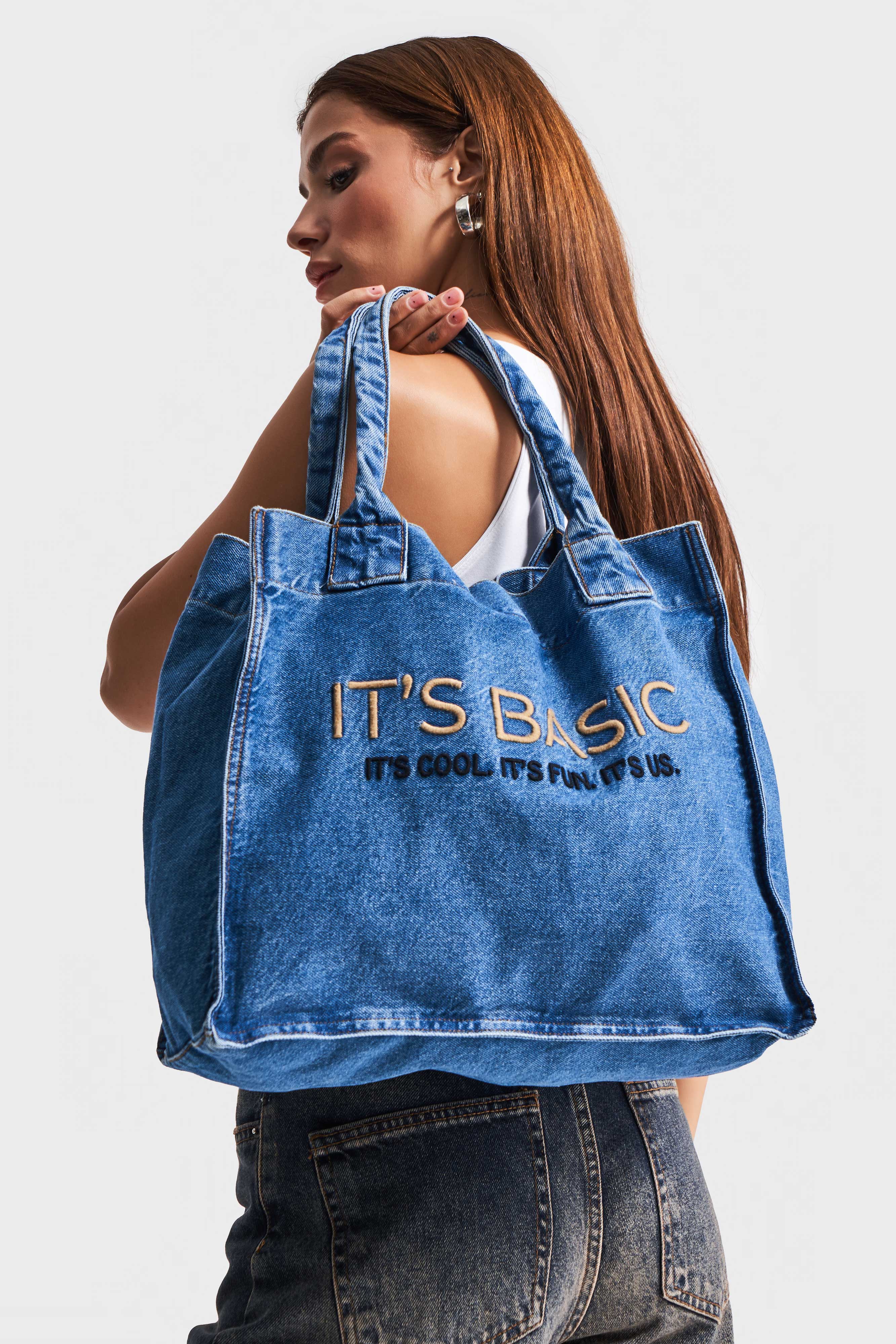 Its basic Embroidered Gusseted Shoulder Denim Bag in Blue Denim Color