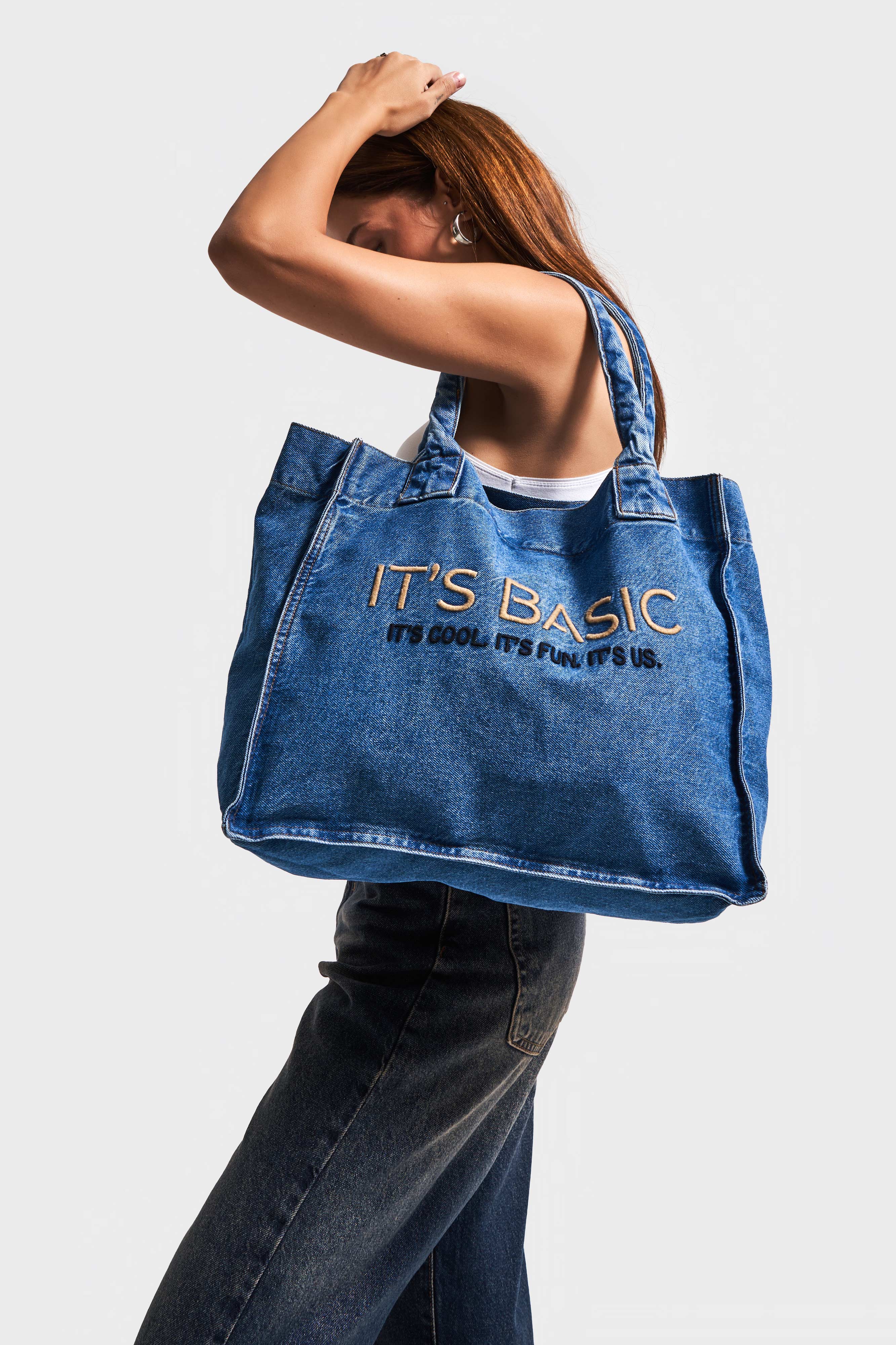 Its basic Embroidered Gusseted Shoulder Denim Bag in Blue Denim Color